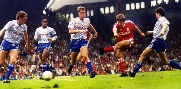 Peter Beardsley scores for Liverpool against Manchester United at Anfield