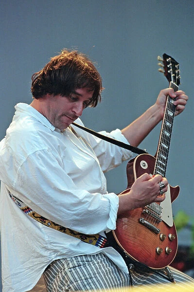 Picture shows guitarist Peter Buck. REM pictured performing in Germany in