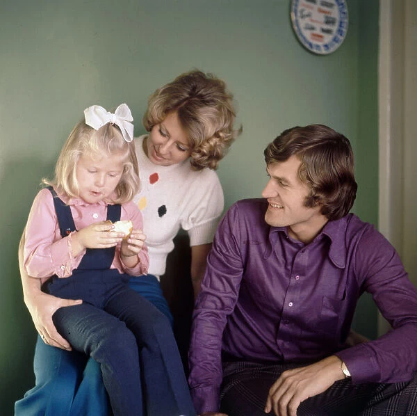 Poland footballer Wlodzimierz Lubanski at home with his wife and daughter