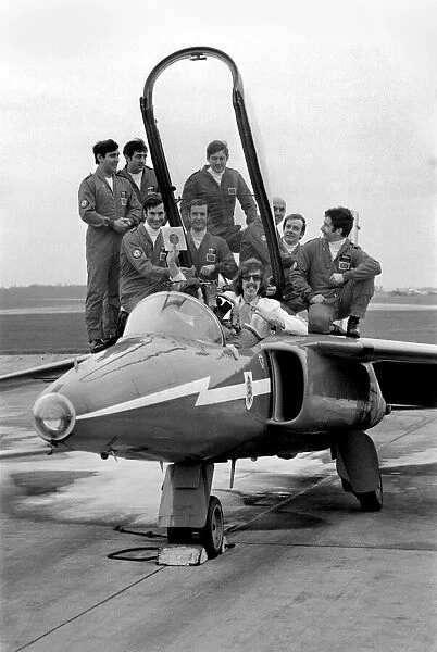 Pop Artist: Bob Rowe with famous R. A. F. team the Red Arrows. January 1975 75-00183-002