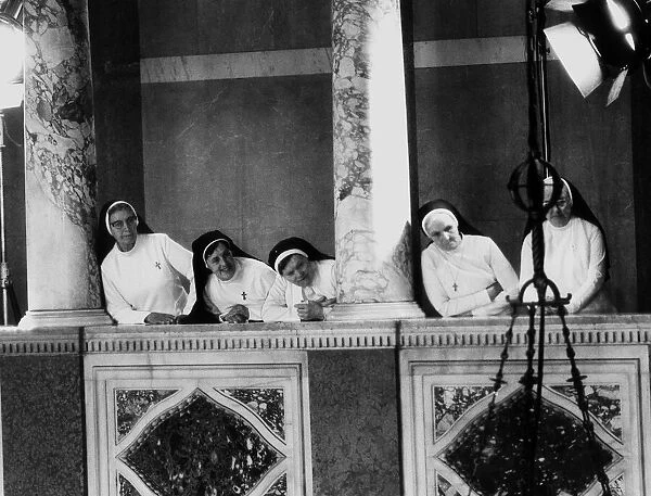 Pope John Paul II visits Britain May 1982 Nuns look down from a balcony as
