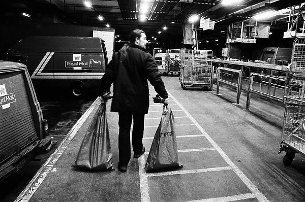 Post office workers sorting the Christmas mail at Coventry Sorting Office