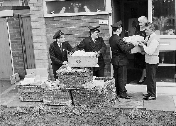 Postmen deliver cards and letters to Mr. Mrs. Harrisons residence, Liverpool