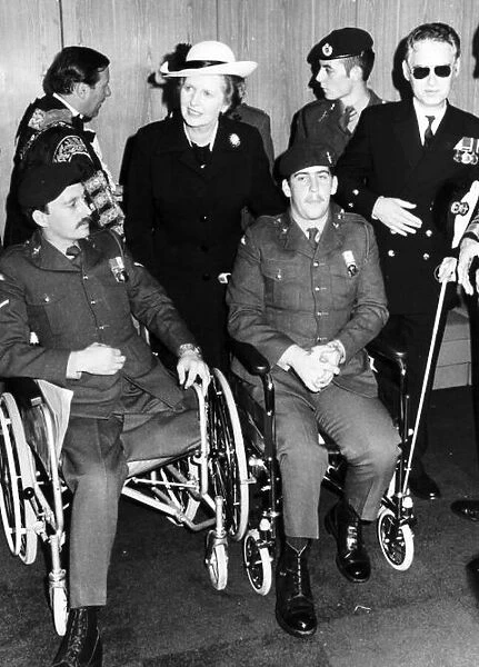 Prime Minister Margaret Thatcher speaking to soldiers wounded in the Falklands War at a