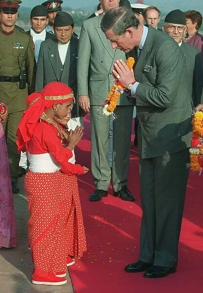 Prince Charles in Kathmandu, Nepal, February 1998 He bows his head as he meets five