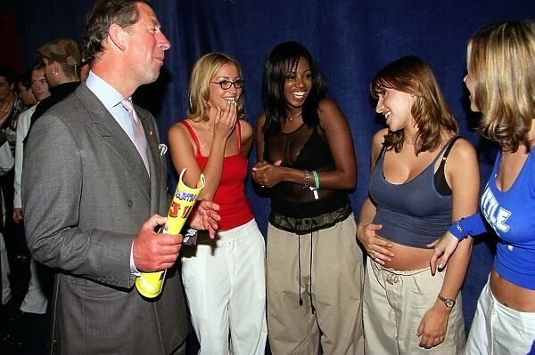 Prince Charles meets All Saints pop group backstage at the Party In The Park Princess