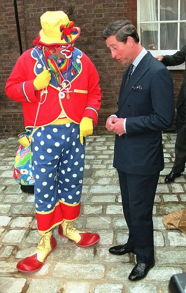 Prince Charles meets Boo Boo the clown at the Princess Youth Business Trust