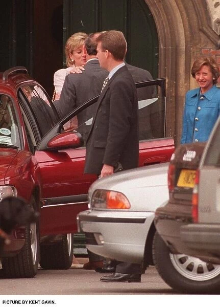 Prince Charles and Princess Diana kissing after being at Eton College for Eton Open Day