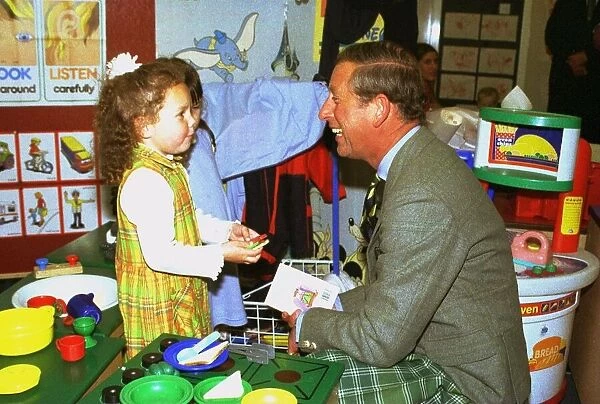 Prince Charles September 1998 HRH Prince Charles laughs with 4 yr old Savannah
