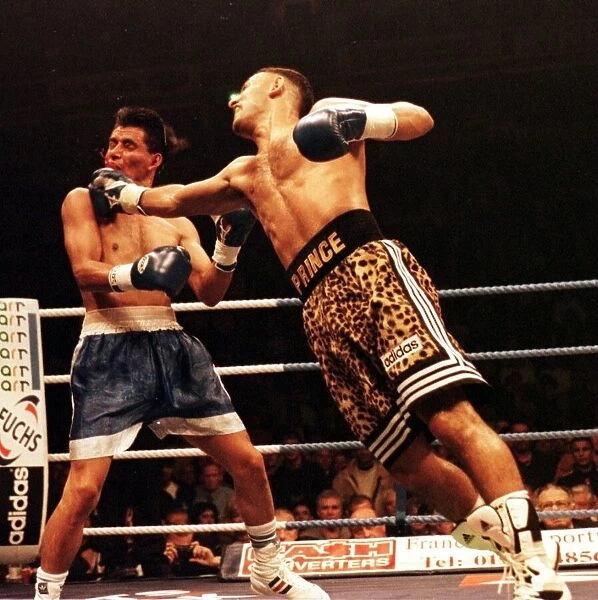 Prince Naseem Hamed lands a right hand on the jaw of Remigio Molina of Argentina in their