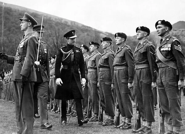 Prince Philip visiting Wales. The Guard of Honour of the Welch Regiment being inspected