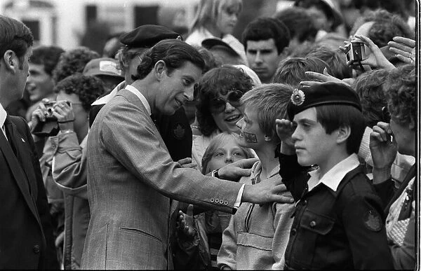 Prince and Princess of Wales in Canada 1983 Prince Charles inspects a young boy