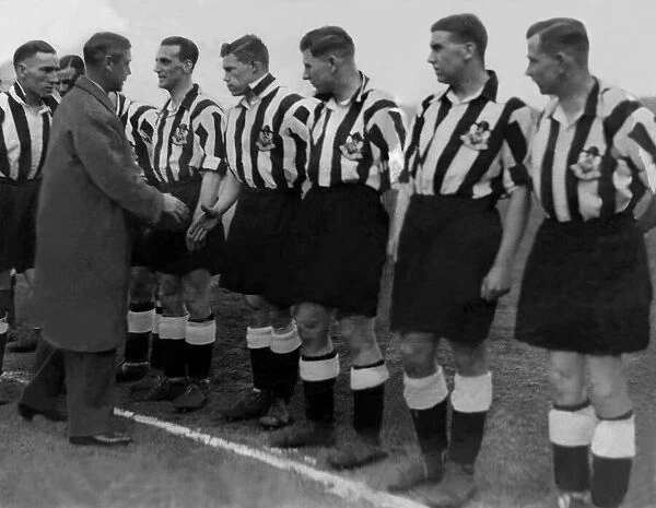 The Prince of Wales shaking hands with Newcastle United team