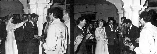 PRINCESS DIANA HITTING PRINCE CHARLES WITH AN IMITATION BOTTLE DURING A VISIT TO THE SET