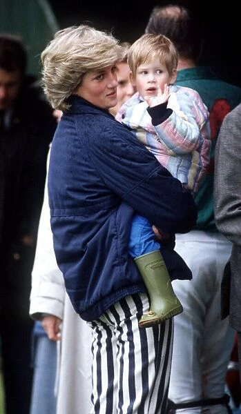 Princess Diana with Prince Harry at Smiths Lawn, Windsor. May 1987