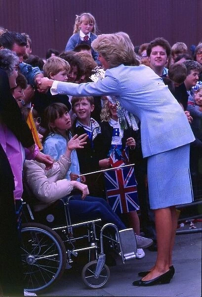 Princess Diana Princess of Wales shaking hands with the crowds on a visit to Glasgow