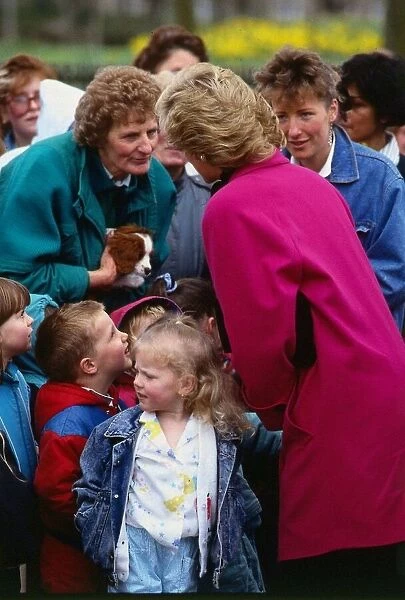 Princess Diana, Princess of Wales, talking to a woman in the crowd on a visit to Aberdeen