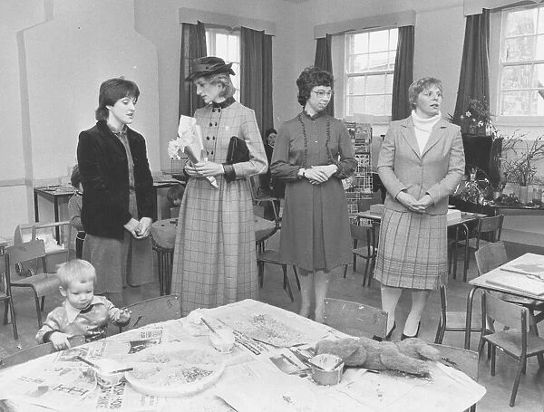 Princess Diana with staff at the Bovey Tracey Church Playgroup in 1983