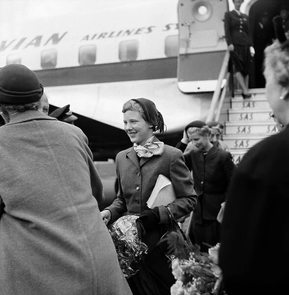 Princess Margrethe, with her mother Queen Ingrid of Denmark (back to camera)