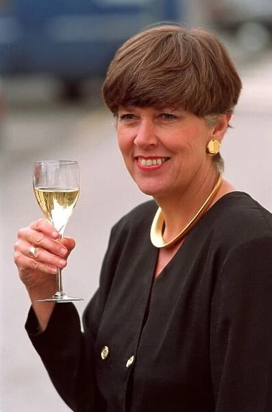 PRUE LEITH, WITH GLASS OF CHAMPAGNE, IN PHOTOCALL TO CELEBRATE BUSINESSWOMAN OF THE YEAR