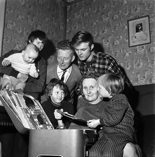 Pulling out vinyl records at her Acton Terrace home in Wigan is Mrs