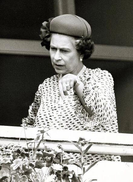 Queen Elizabeth II at Derby Day 1982 at Epsom Pointing downwards at possible
