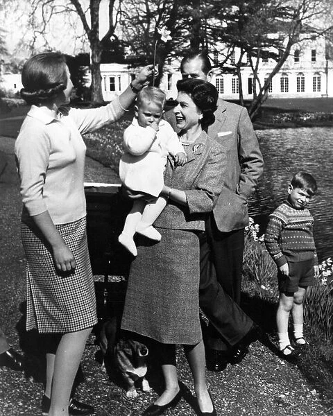 Queen Elizabeth II, pictured at Windsor Castle with Prince Philip and children