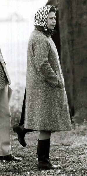 Queen Elizabeth II standing on one leg looking silly. June 1980