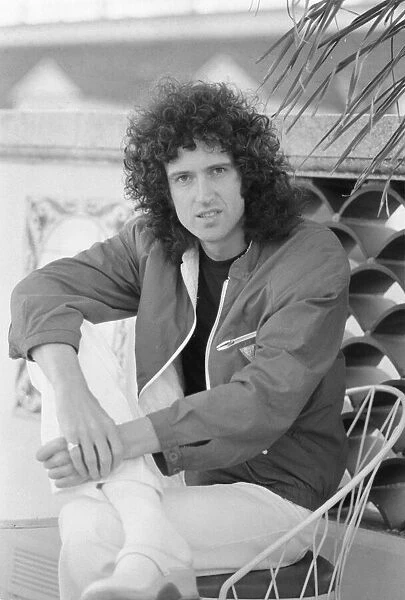 Queen guitarist Brian May seen here relaxing in a roof top garden in New Orleans, USA