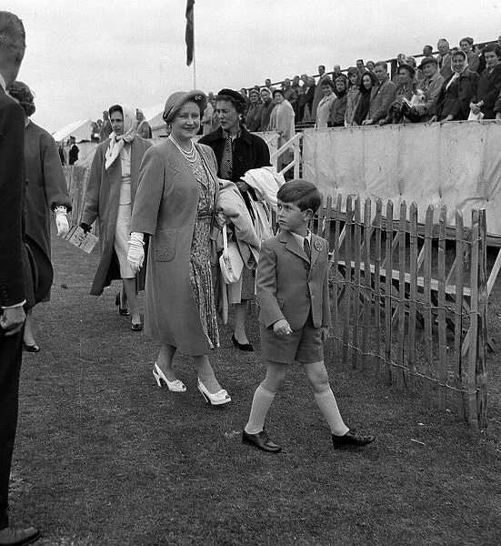 The Queen Mother with Prince Charles. June 1955 They head towards watching