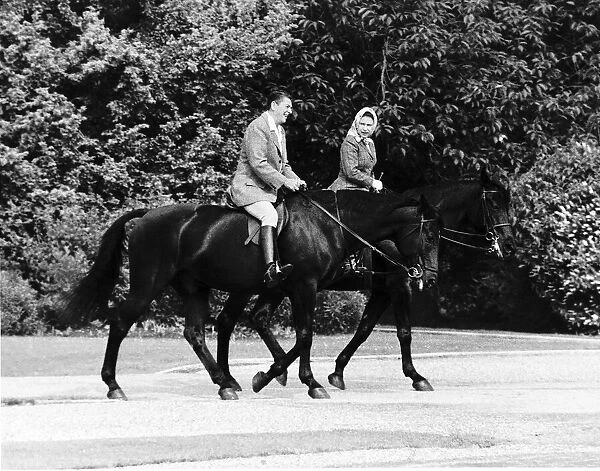The Queen riding beside President Reagan at Windsor. June 1982