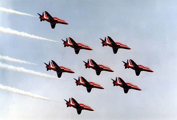 The RAFs Red Arrows display team perform in their BAE Hawk aircraft at
