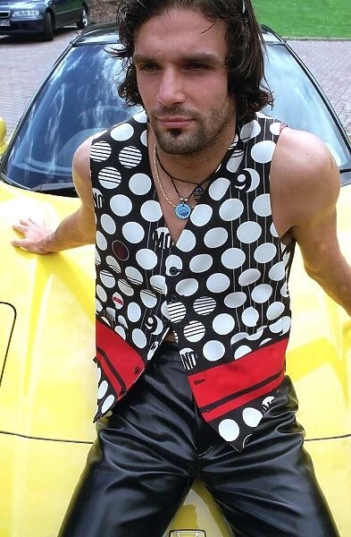 RANGERS ITALIAN ACE MARCO NEGRI WEARING CLOTHES FROM CRUISE