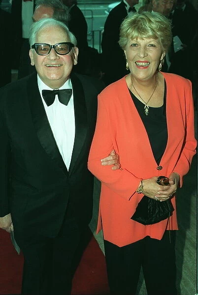 Retired comedian Ronnie Barker and his wife arrive at the Bafta awards ceremony