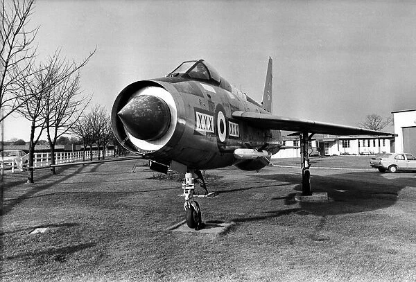 A retired RAF English Electric Lightning jet fighter aircraft on display outside RAF