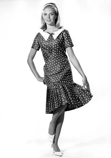 Reveille Fashions 1965: Maureen Walker wearing collared dress. April 1965 P006723