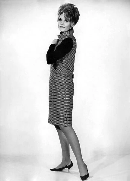 Reveille Fashions 1966: Delia Freeman apron dress. February 1966 P006664