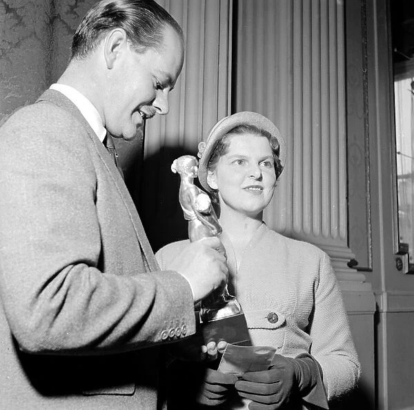 Reveille present the award of Britains Ideal Housewife for 1957 to Mrs PC Hebblewaite