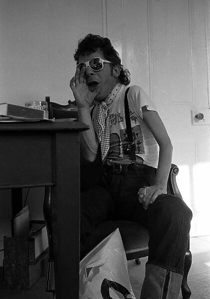 Rock Star Ian Dury poses during an exclusive interview for the Daily Mirror in his