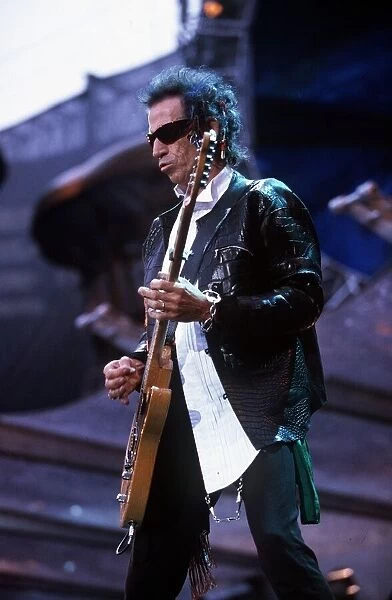 Rolling stones in concert at Wembley Stadium 12th June 1999 Keith Richards playing