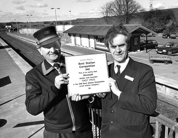 Ronnie Breeze and Gordon Wood (right) at Alnmouth Railway Station with their award of