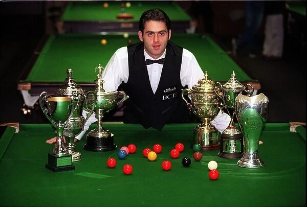 Ronnie O Sullivan with trophies on table September 1997