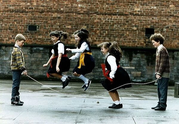 Scotland Street School four children playing skipping jumping ropes