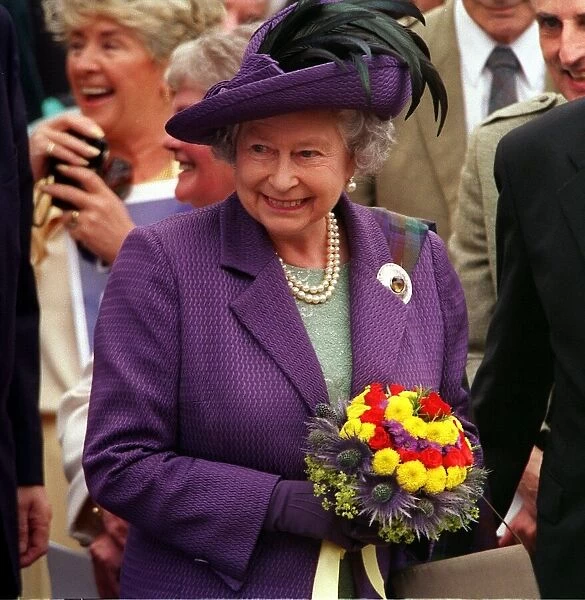 Scottish Parliament Opening Ceremony July 1999 Queen Elizabeth receives thistle posy