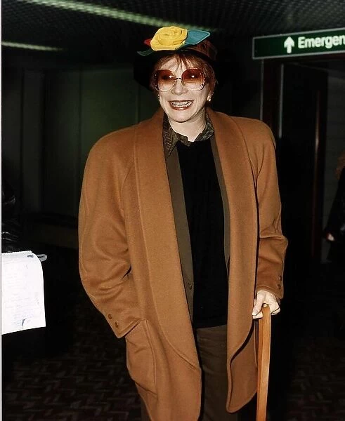 Shirley Maclaine the actress arriving at Heathrow