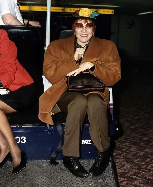 Shirley Maclaine the actress at Heathrow airport to continue her One woman show