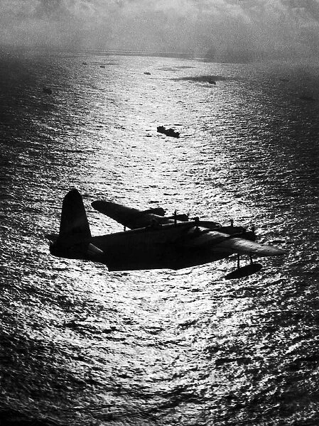 Shorts Sunderland Flying Boat of the RAF Coastal Command patrols above an Atlantic