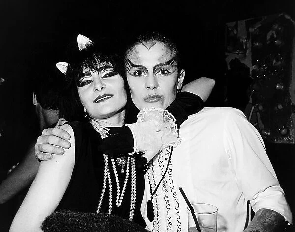 Siouxsie with the drummer of the culture club at a halloween party in a night club