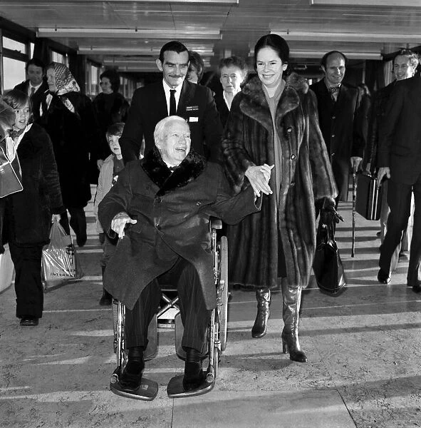 Sir Charlie Chaplin and wife Dona. January 1975 75-00204-002