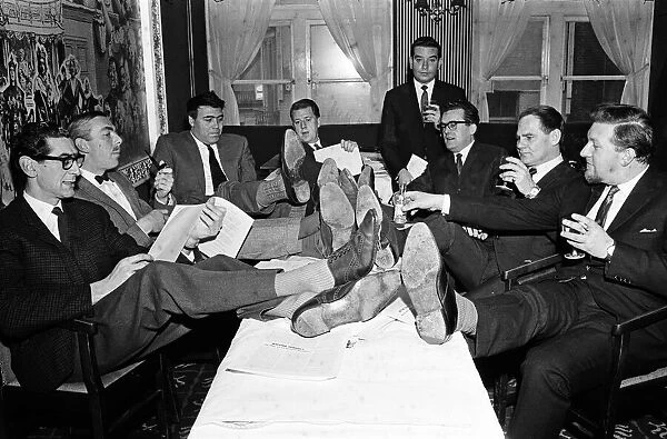 Sitting around the table are comedy writers (L-R) Denis Norden, Frank Muir, Alan Simpson